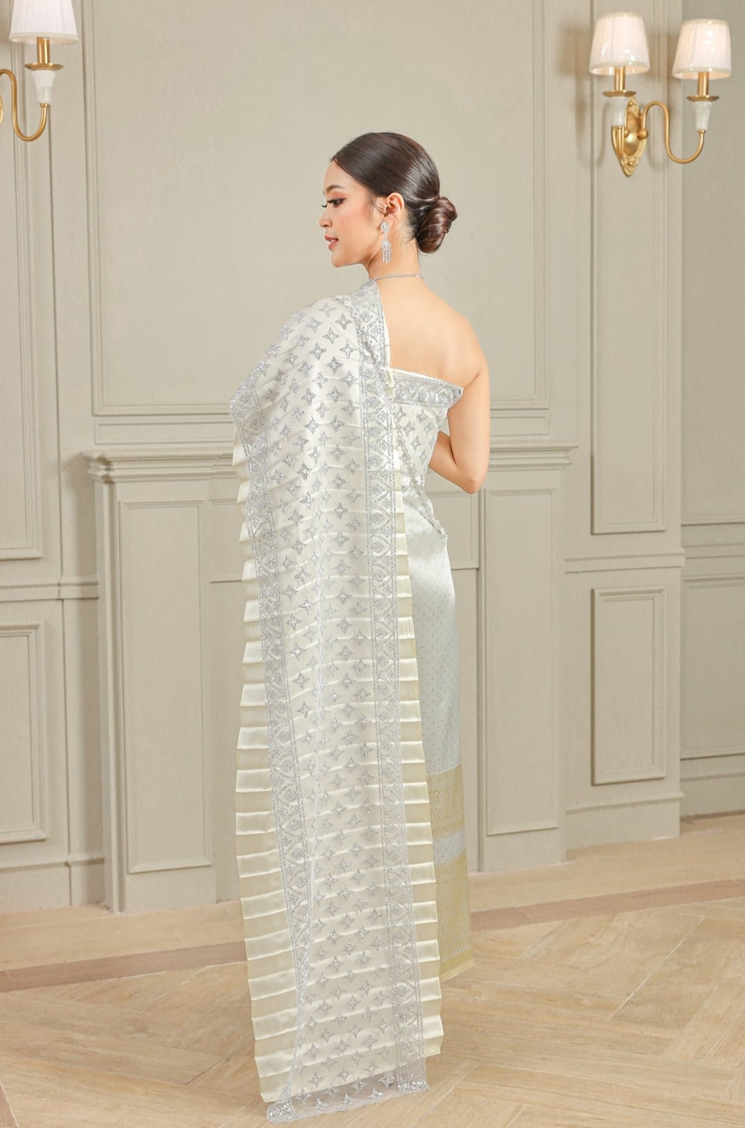 Photo of woman dressed in a Thai wedding dress