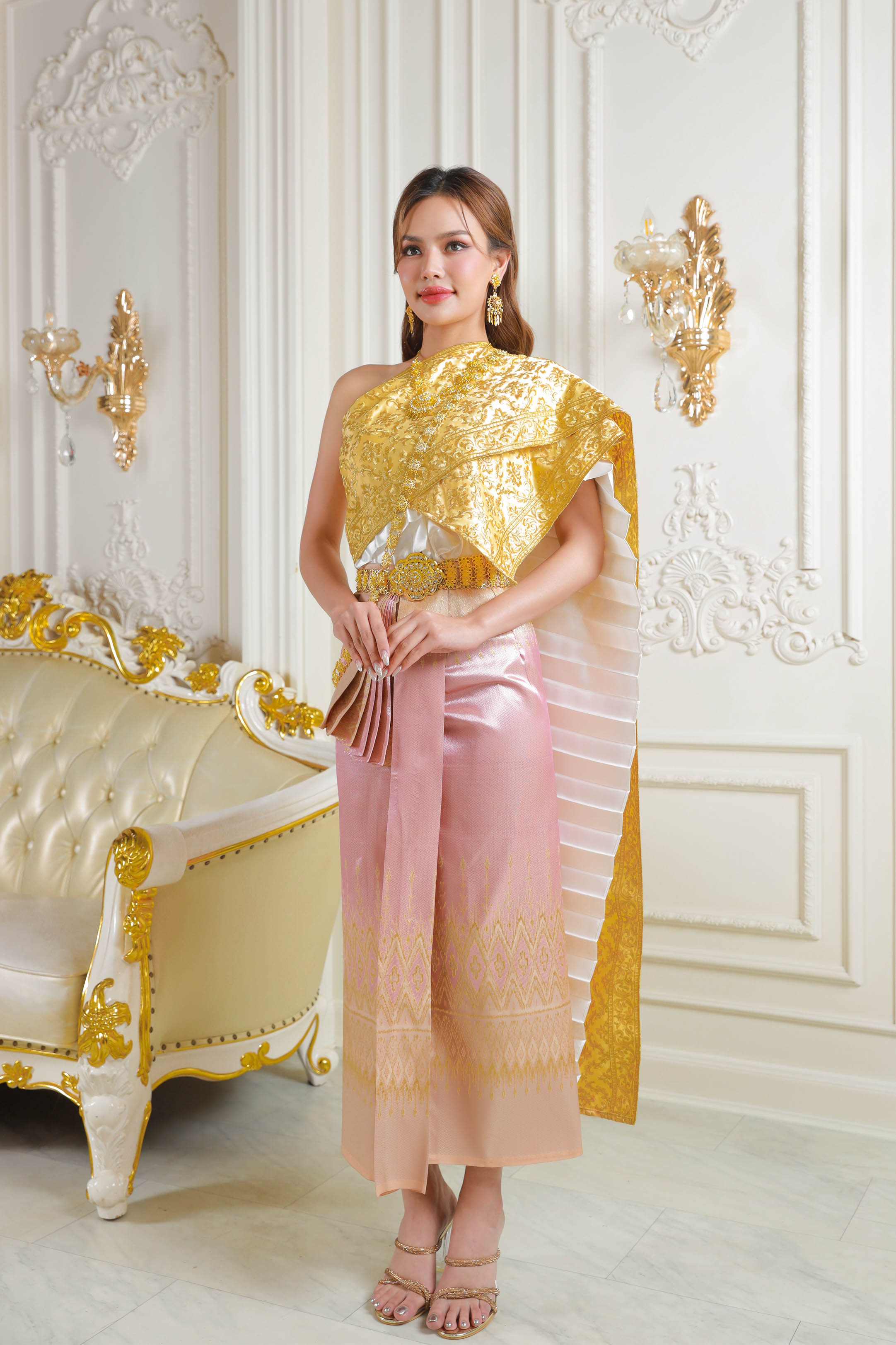 Thailand's National Costume in gold and pink detail