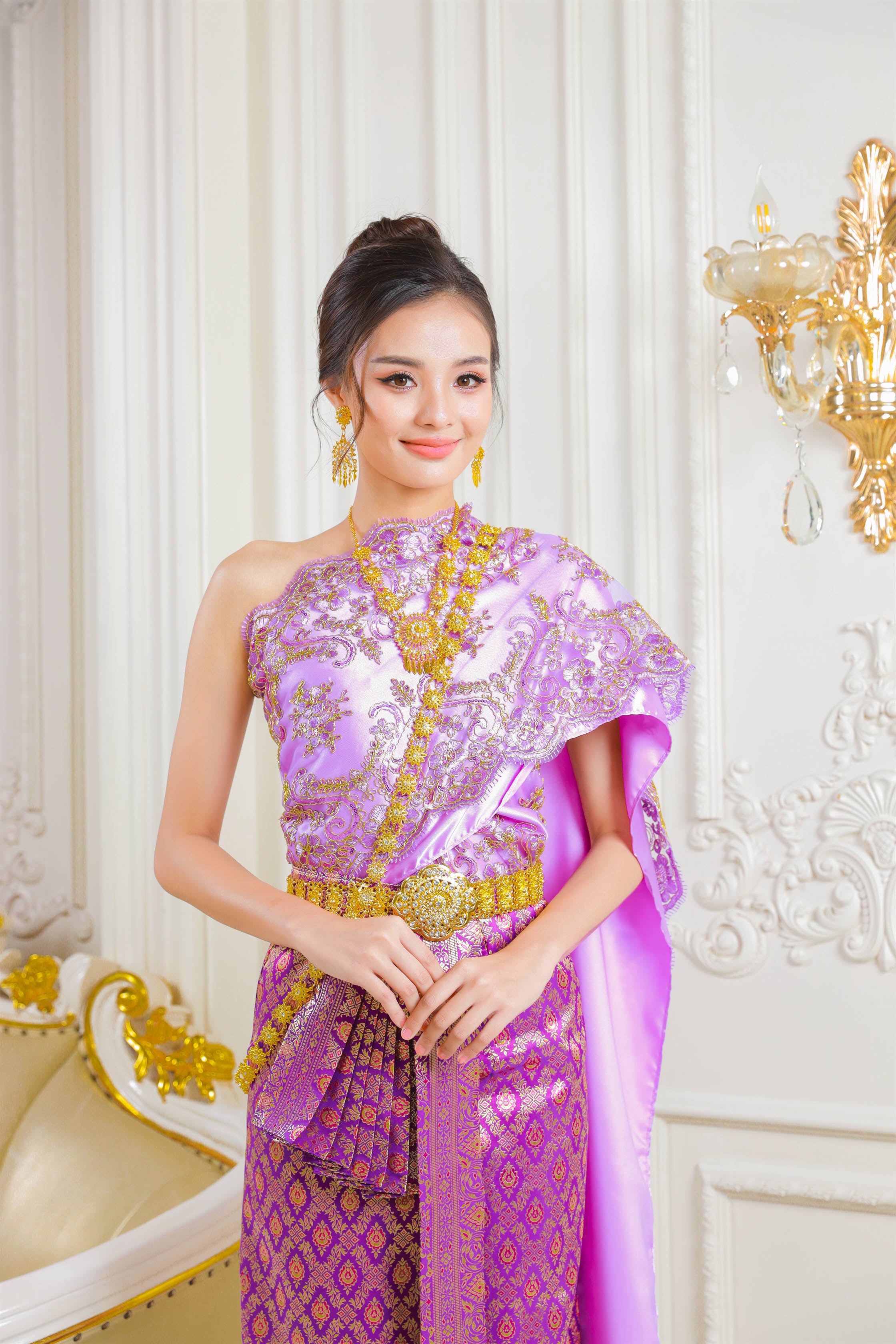 Traditional Thai dress in purple with lace detailing